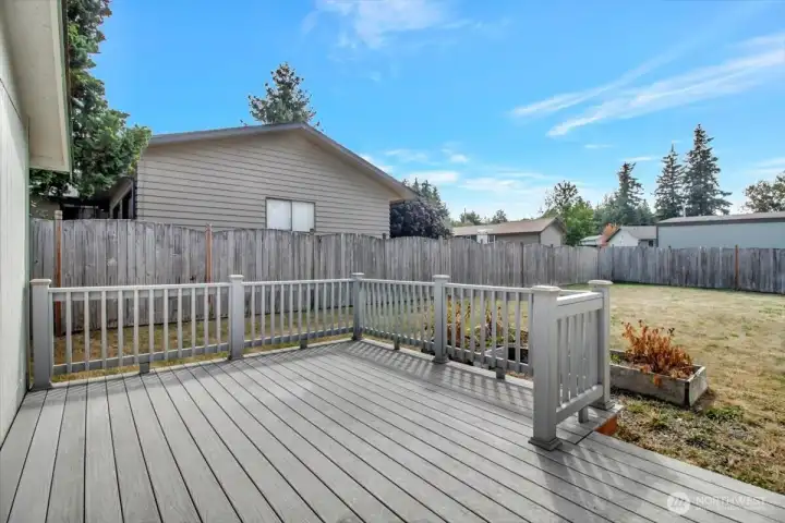 Trex deck off the family room is the perfect place for outdoor dining.