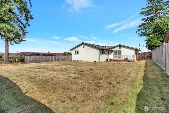 Huge backyard is fully fenced.
