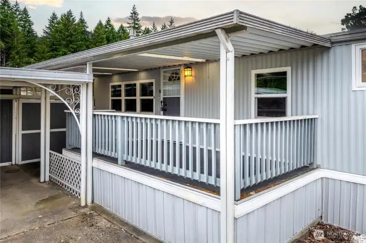 Large deck off the front of the home offers great space for enjoying fresh air during the summer.
