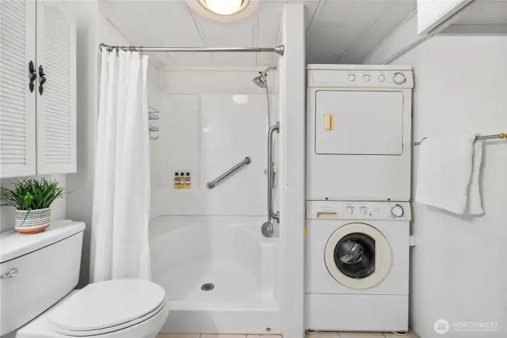 Convenient stacking washer and dryer stay with the house.