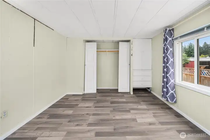 The main bedroom is a good-size and has two large windows to keep it bright.