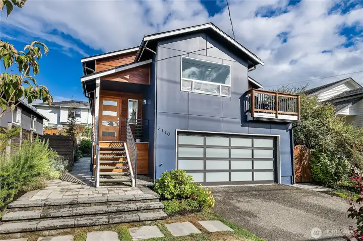Rare large 2-car garage with tons of extra storage and 2nd fridge, not to mention 60 Amp dedicated circuit with hard-wired EV charger controlled via the SPAN Smart Electrical Panel (which is wi-fi enabled to work with the SPAN app).