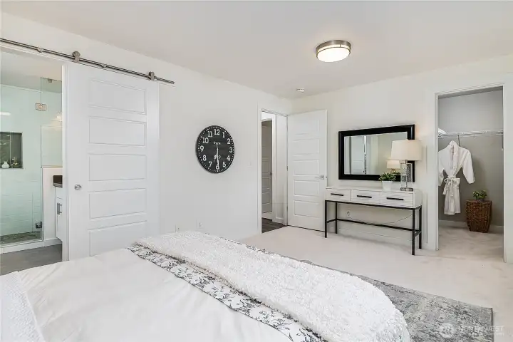 Very spacious primary suite with walk-in closet and dual-sink 3/4 bath is 1 of 3 bedrooms on upper level (2 more bedrooms + the office / den with tri-fold sliding doors, full bath, family room and garage all on lower level).