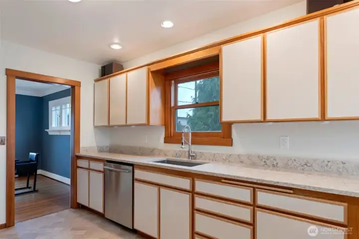 Step into this chef's dream kitchen with all new quartz counters & stainless steel appliances.