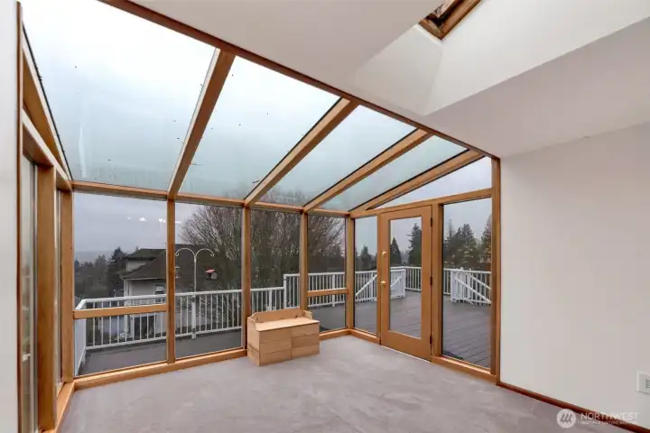 From the solarium, step out onto this spacious deck and enjoy the views all of the Pacific Northwest beauty!