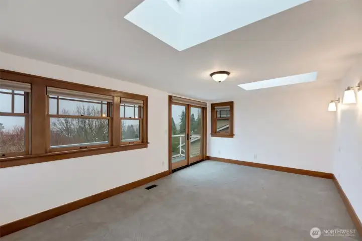 Here is a primary suite you'll never want to leave. You have views of the Cascade mountains and your own personal french door balcony!