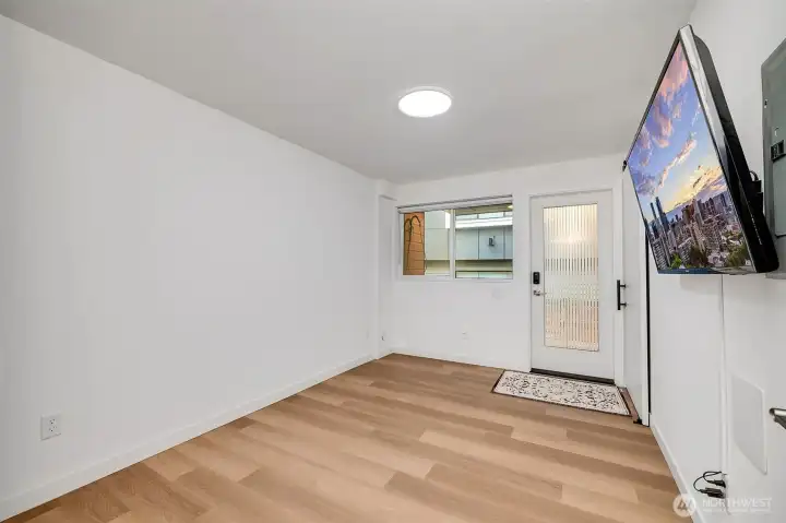 lower level bedroom with it's own exterior door to the ground level patio.