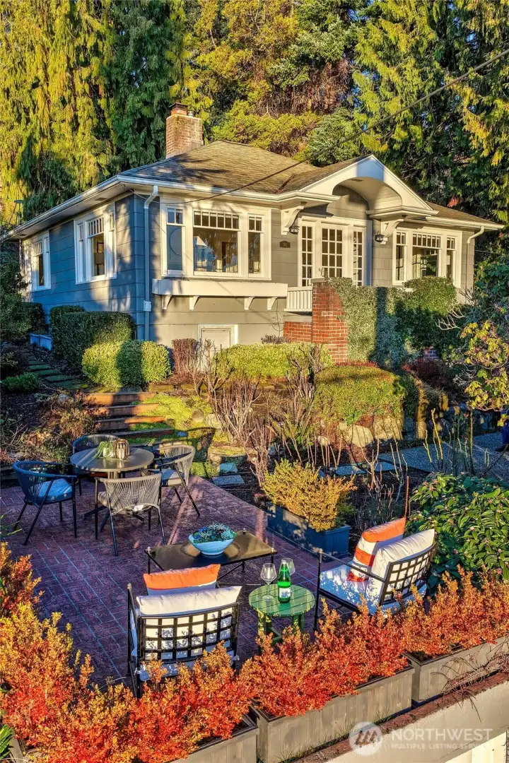 Sunny Cape Cod in serene private setting with sparkling lake, mountain and skyline views.