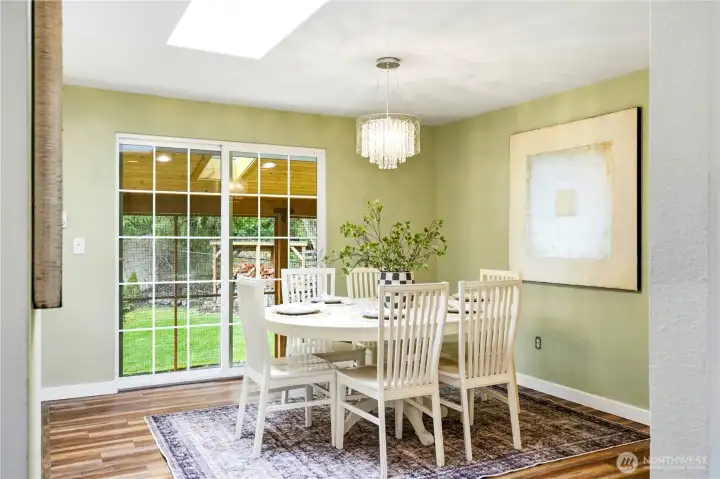 Very spacious dining room, plenty of room to add a larger table than what is pictured