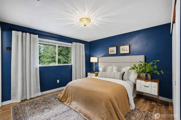 Warm and inviting primary bedroom