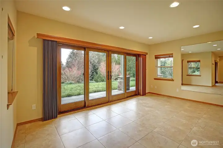 Open flex space downstairs.  Heated floors & walkout covered patio.