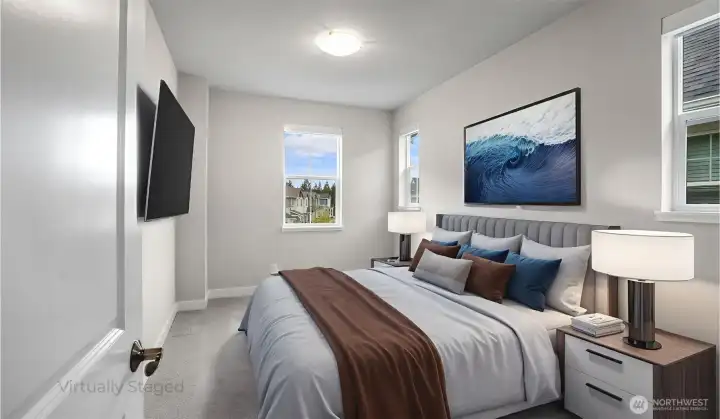 One of two additional bedrooms on the upper level- virtually staged