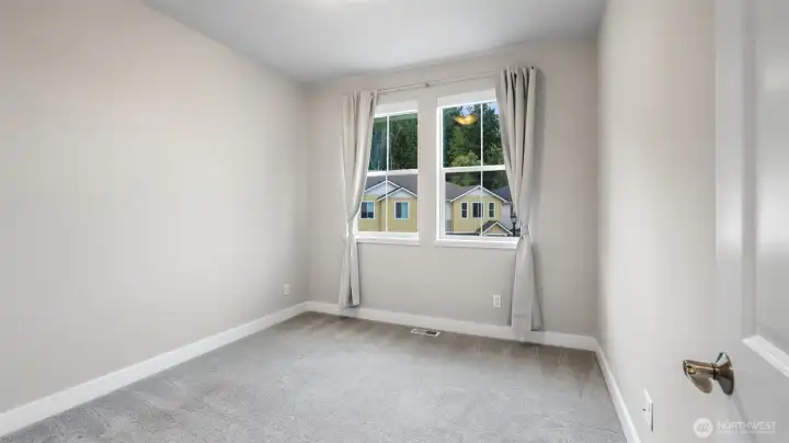 Second upper level bedroom with walk-in closet