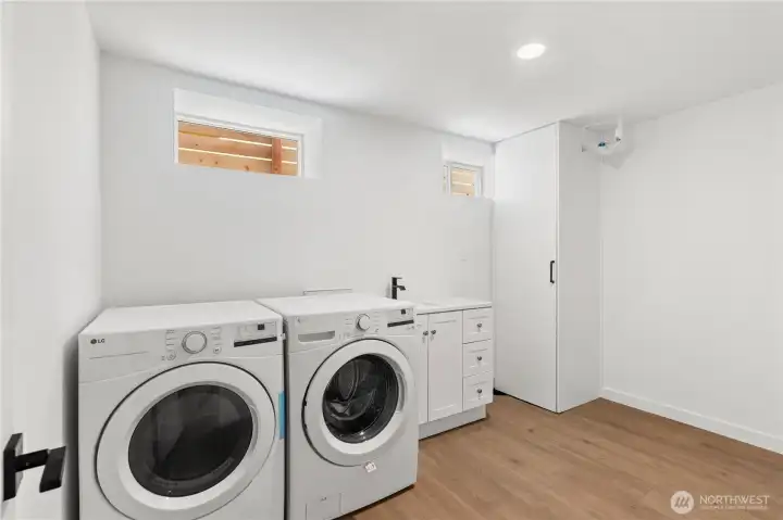 Brand new laundry room/utility room with a built in sink