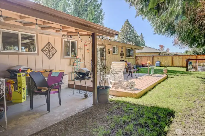 Covered Patio off utility room and deck off dining room allowing the pest of both shade time and sun soaking opportunities