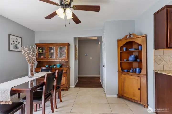 Hallway leads to the living room on the right and bedrooms to the left