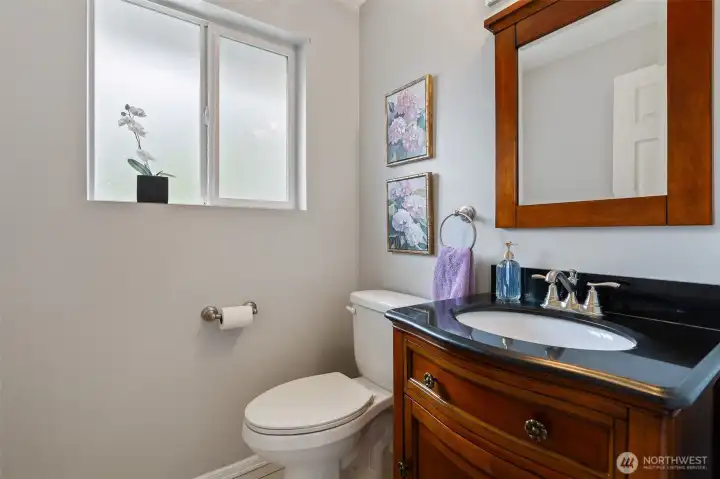 Half-bath between the dining room and the game room