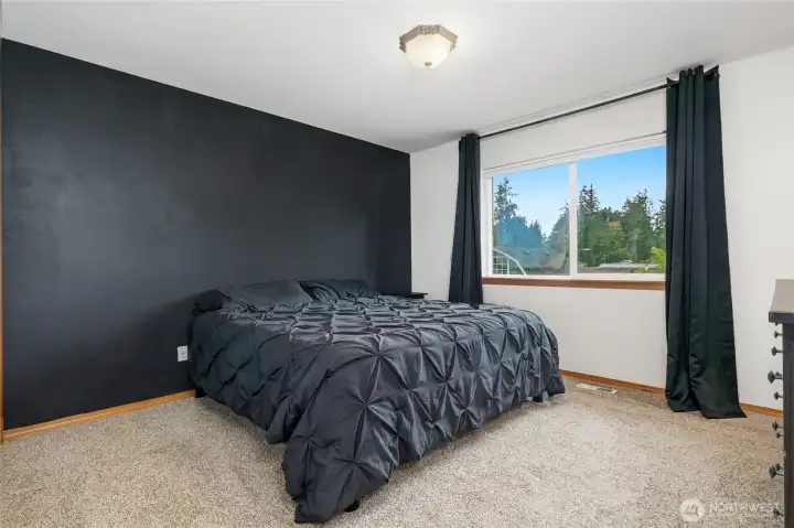 Primary Bedroom with walk-in closet and full ensuite.
