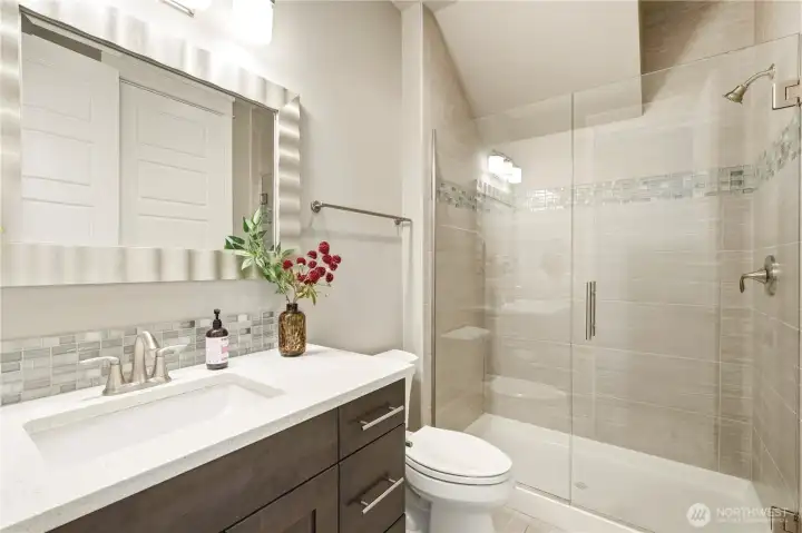 The 3/4 bathroom on the main level.
