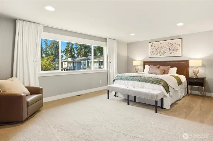 A very spacious primary bedroom.