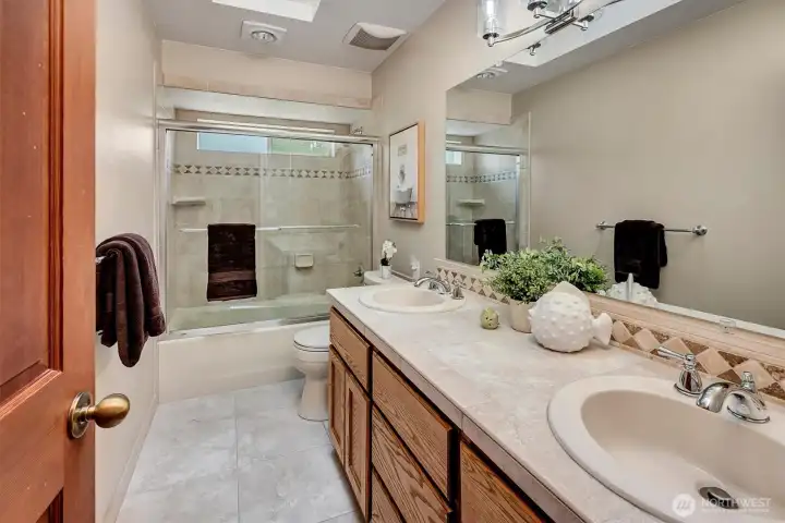 Hallway Bathroom with 2 sinks