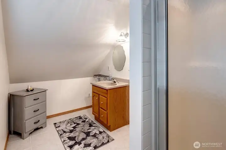 Guest quarters bath with shower.
