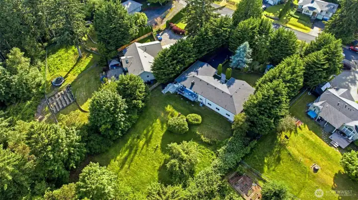 A rare combination of privacy, acreage, mature landscaping, and proximity to schools, parks, and everyday conveniences.