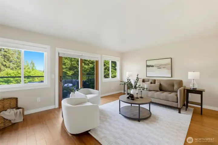 Spacious gathering room filled with natural light, designed for comfortable everyday living and effortless entertaining.