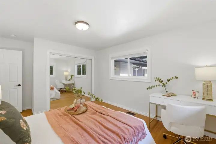 Comfortable upper-level bedroom (1 of 3 upstairs) offering flexibility for family, guests, or hobbies.