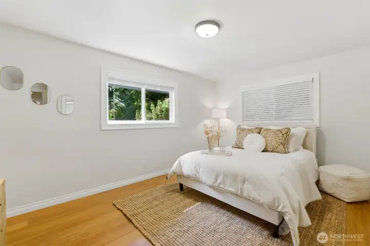 Comfortable upper-level bedroom (1 of 3 upstairs) offering flexibility for family, guests, or hobbies.