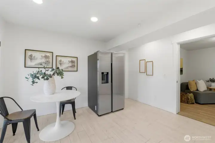 Featuring a kitchen, breakfast nook, family room, and flexible bonus space, this lower-level retreat provides endless possibilities for guests, remote work, hobbies, recreation, or multi-generational living.