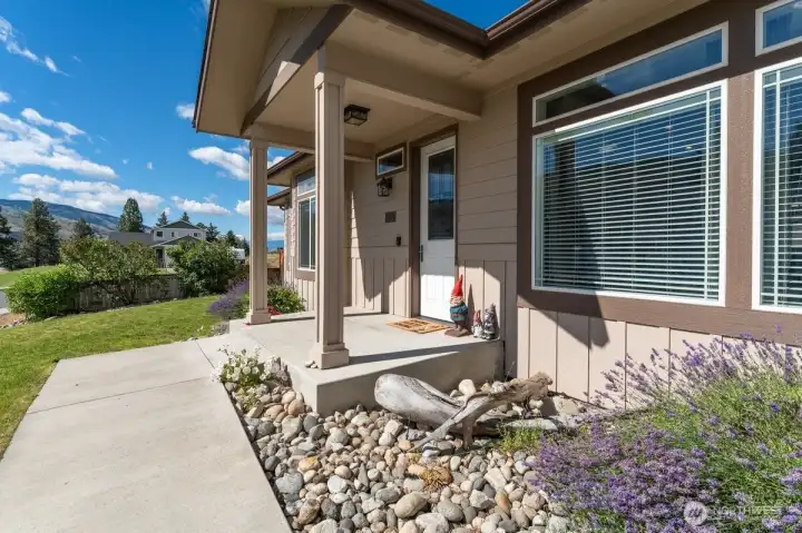 Covered front entry. Welcoming curb appeal with manicured landscaping and attractive exterior finishes. Covered front entry. Welcoming curb appeal with manicured landscaping and attractive exterior finishes.