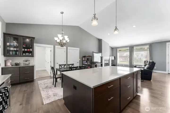 Chef-inspired kitchen with custom cabinetry and a extra large center island. Chef-inspired kitchen with custom cabinetry and a extra large center island.
