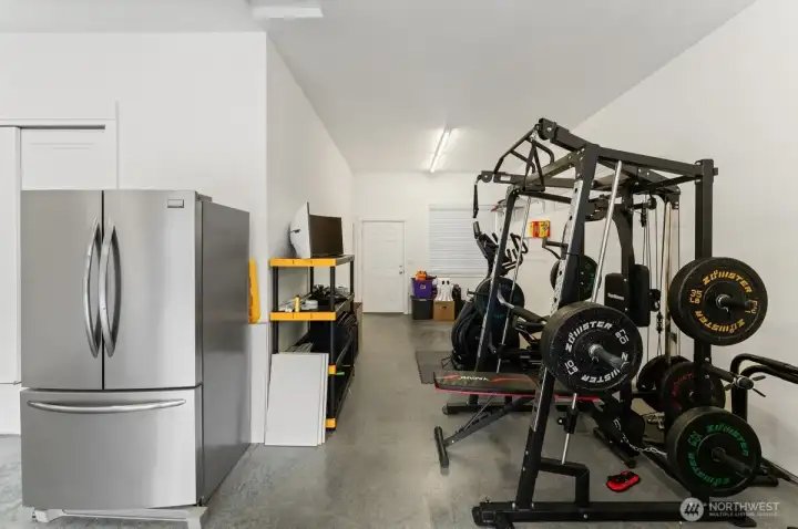Backyard access from interior of garage. Backyard access from interior of garage.