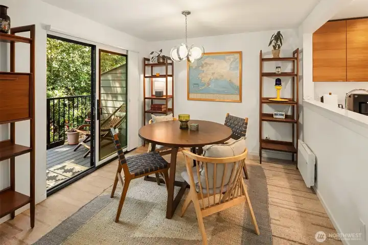 The dining room opens to a terrific deck that looks out over the lower patio garden and into the serenity of the adjacent greenbelt. The dining room opens to a terrific deck that looks out over the lower patio garden and into the serenity of the adjacent greenbelt.