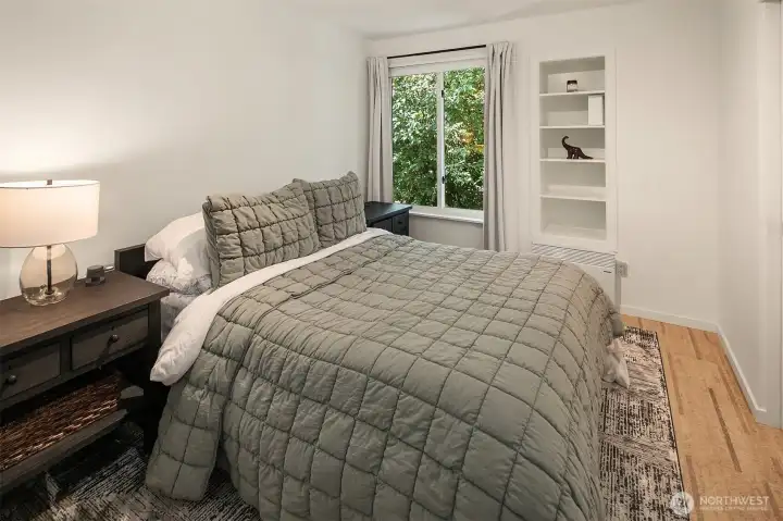 Bedroom #3. Note the high-efficiency ceramic heater. These replaced the previous baseboard heaters throughout the home and provide added comfort and more flexibility in the spaces. Bedroom #3. Note the high-efficiency ceramic heater. These replaced the previous baseboard heaters throughout the home and provide added comfort and more flexibility in the spaces.