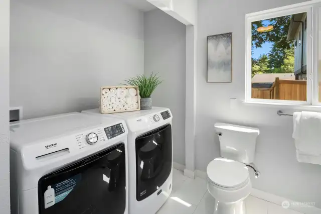 Main level 3/4 bathroom with laundry