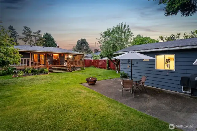 Spacious, well maintained yard with a sizable outbuilding.