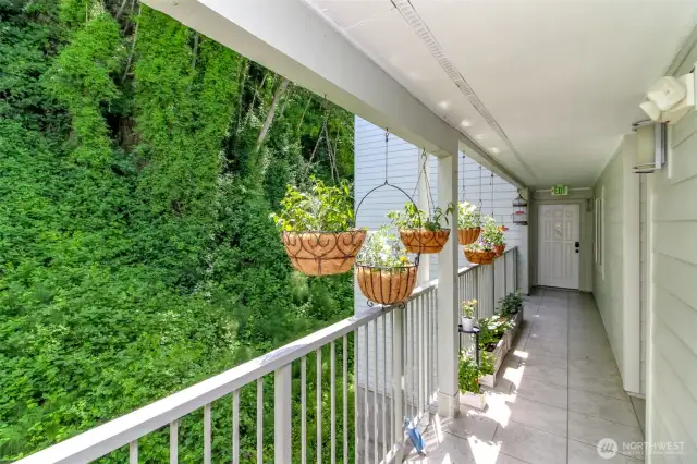 Open air hallway to your unit all covered