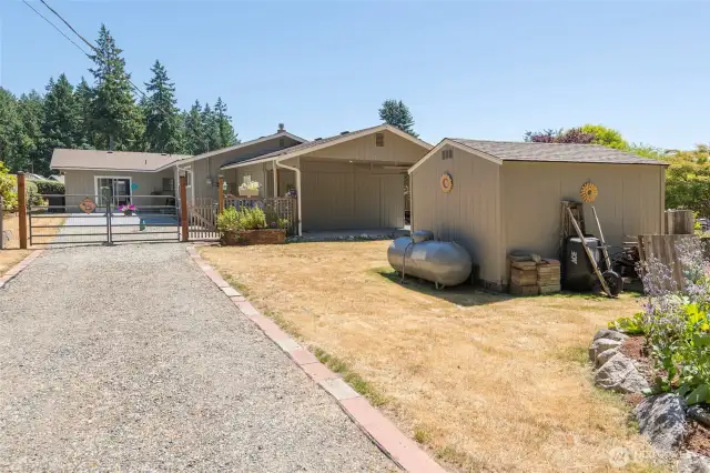 Welcome to your quiet cul-de-sac retreat in Wauna Shores!