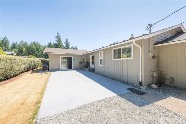 Long driveway with RV parking and hookups for power, water, & sewer.