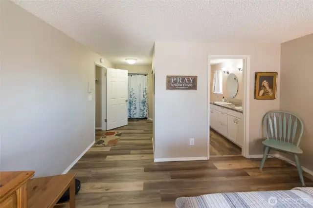 Primary ensuite bath offers convenience and comfort.