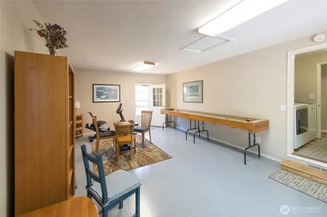 Versatile rec room with endless possibilities—games, gym, or home theater!