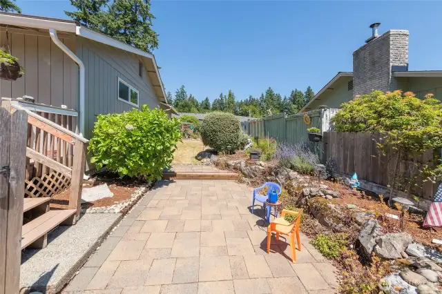 Multiple outdoor areas for relaxing or play.