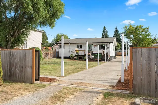 Enjoy the sunset from your front deck with partial Puget Sound & Olympic Mountain view. This cozy 3-bd, 1-bth home is nestled on a .32-acre level lot with ample room to expand.  This is a one of a kind property in the area hosting a 1040 SF 3 car garage/shop, an adorable 140 additional SF detached heated office w/double doors, vaulted ceiling & covered front porch, fully fenced with solar powered automated gate entry, 600+ SF of decking for outdoor living w/greenhouse/"Catio", high efficiency appliances, ample room for RV’s, & only minutes' drive to Salt Water State Park, the new Star Lake link light rail station, & SeaTac airport for travelers. Conveniently located for shopping, near bus line, & easy access to I-5. Agent related to seller.
