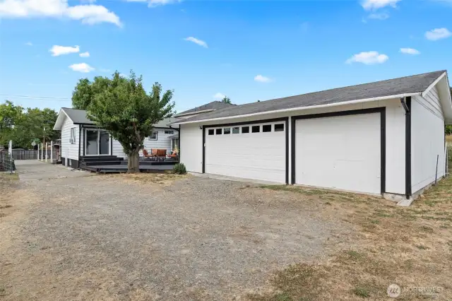 1040 SF 3-car garage with extra shop space.