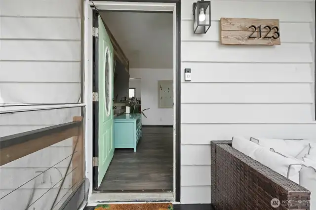 Front entrance to home from front yard decking