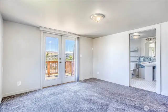 Primary suite with slider to view deck