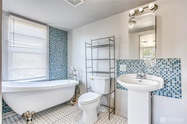 Primary ensuite with footed tub