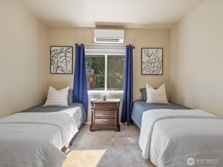 The second bedroom on this side of the home features its own mini-split AC unit, keeping the room cool in summer and cozy in winter—comfort you’ll really appreciate.